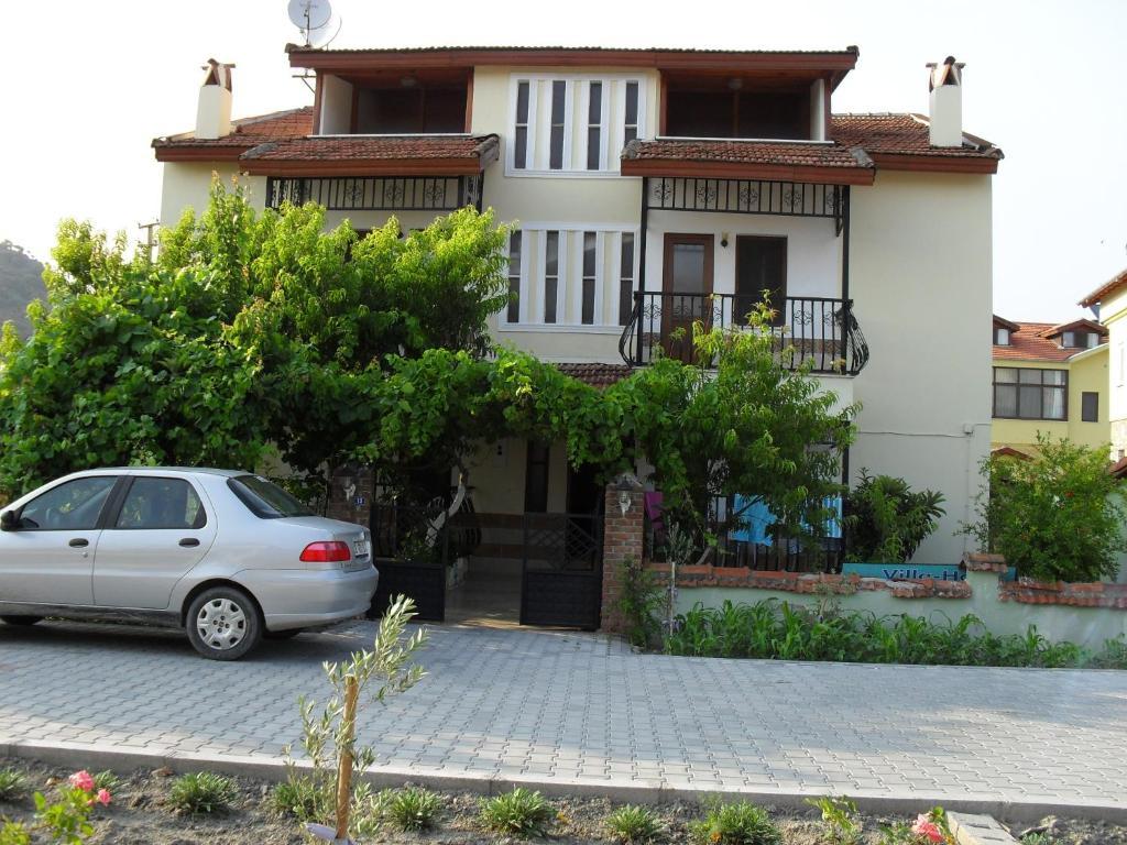 Villa Ozalp Apartments Далян Стая снимка