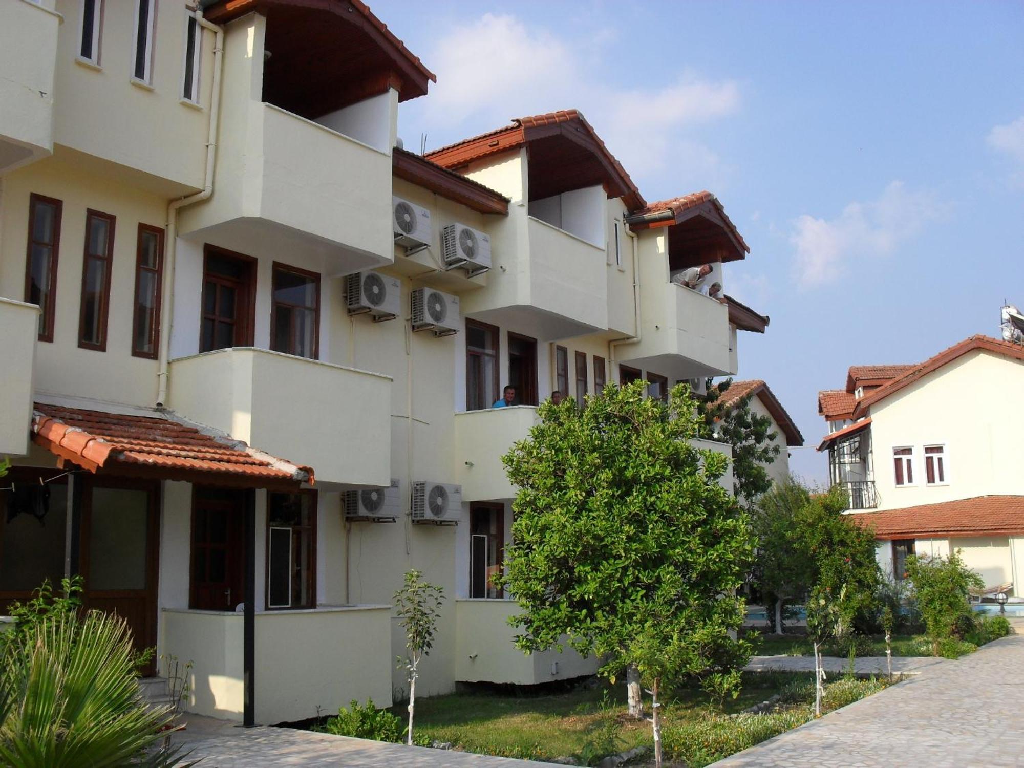 Villa Ozalp Apartments Далян Екстериор снимка