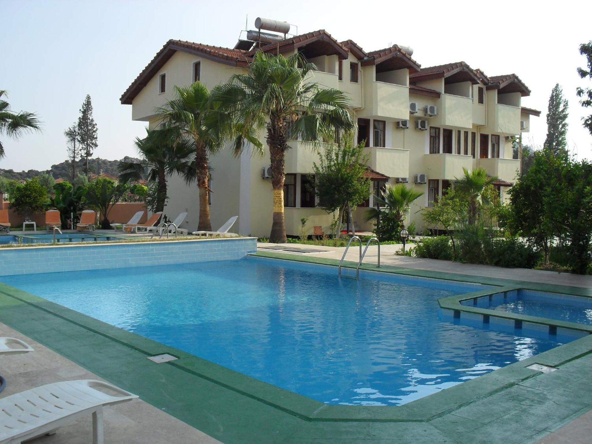 Villa Ozalp Apartments Далян Екстериор снимка