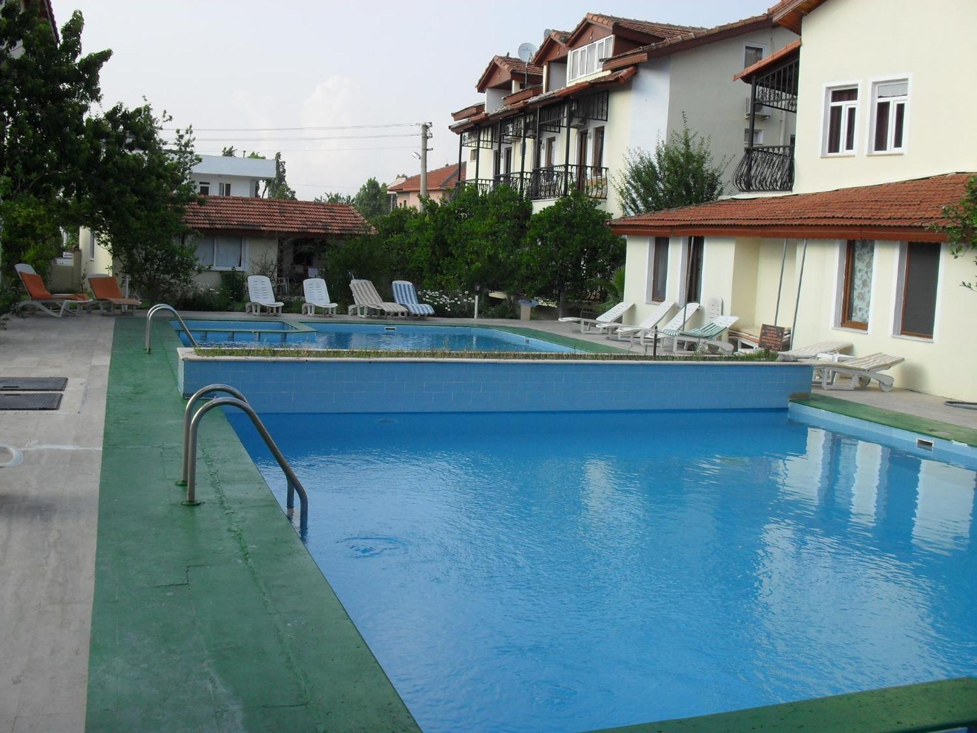 Villa Ozalp Apartments Далян Екстериор снимка