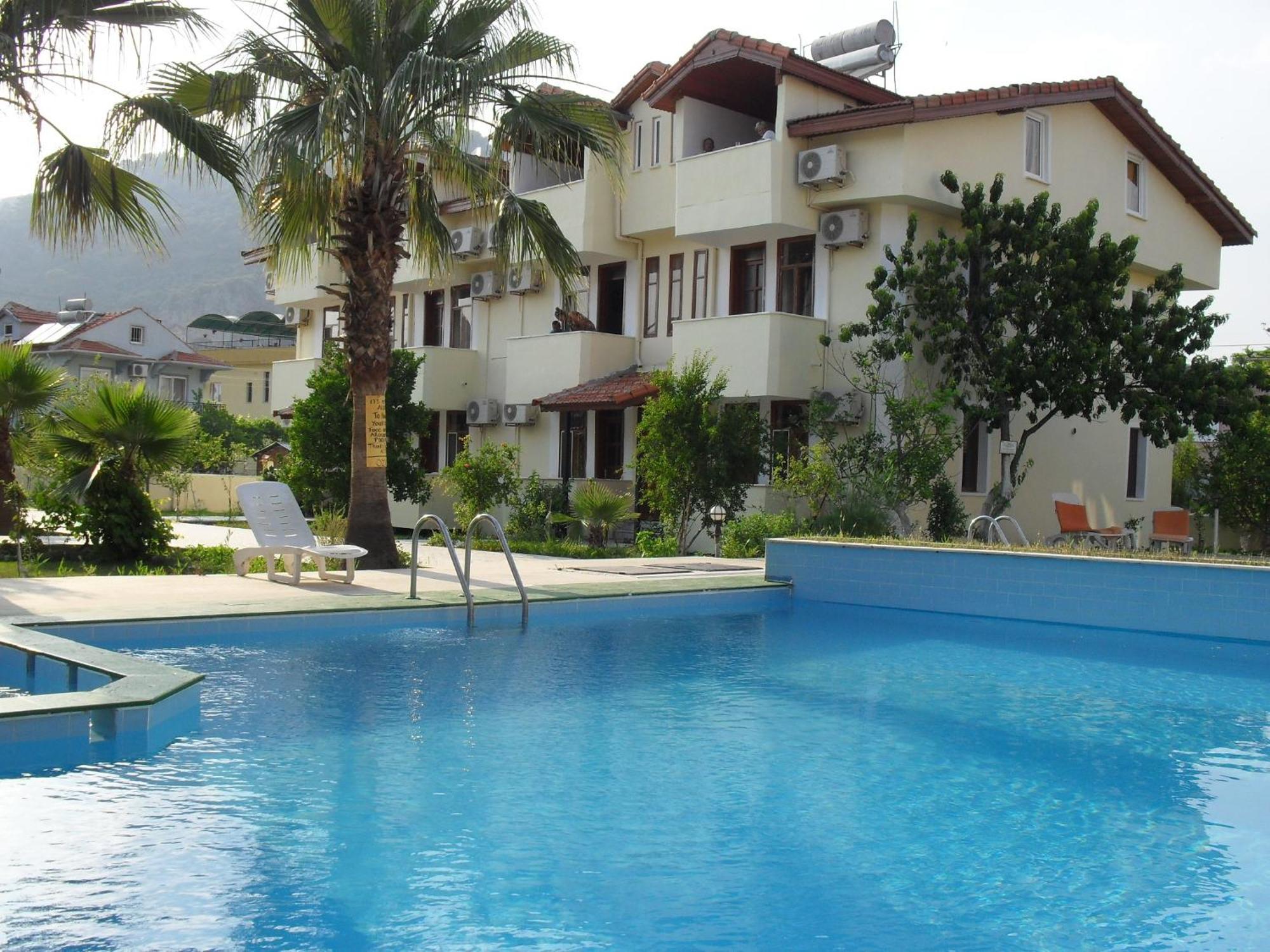 Villa Ozalp Apartments Далян Екстериор снимка
